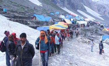 Devotees at Amarnath Cave during Amarnath Yatra Tour Package pilgrimage