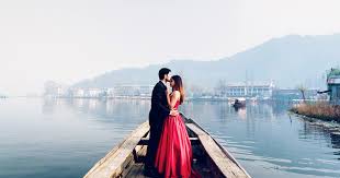 Bride and groom enjoying on a Shikara during a destination wedding in Kashmir | Panda Tours and Travels