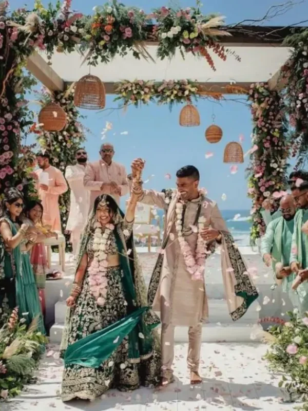 Guests showering flowers over the couple during a joyful destination wedding in Kashmir | Panda Tours and Travels