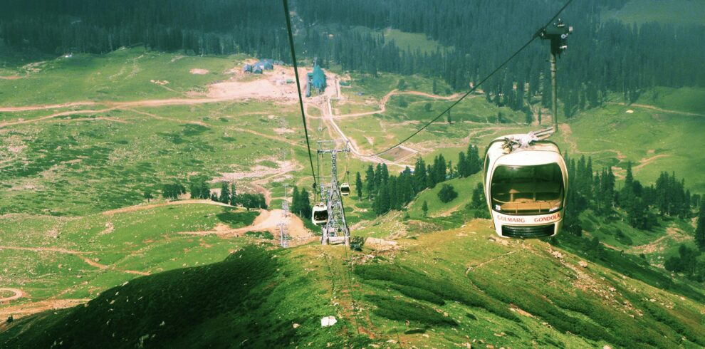 Gondola ride in Gulmarg offering panoramic views of snow-covered mountains | Panda Tours and Travels