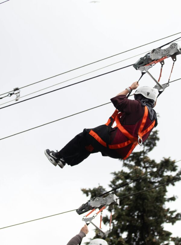 Zipline ride in Pahalgam with tourists enjoying an aerial adventure over scenic valleys of Kashmir | Panda Tours and Travels