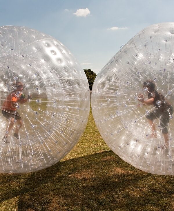 Water zorbing ball in Kashmir with tourists enjoying a fun water adventure activity