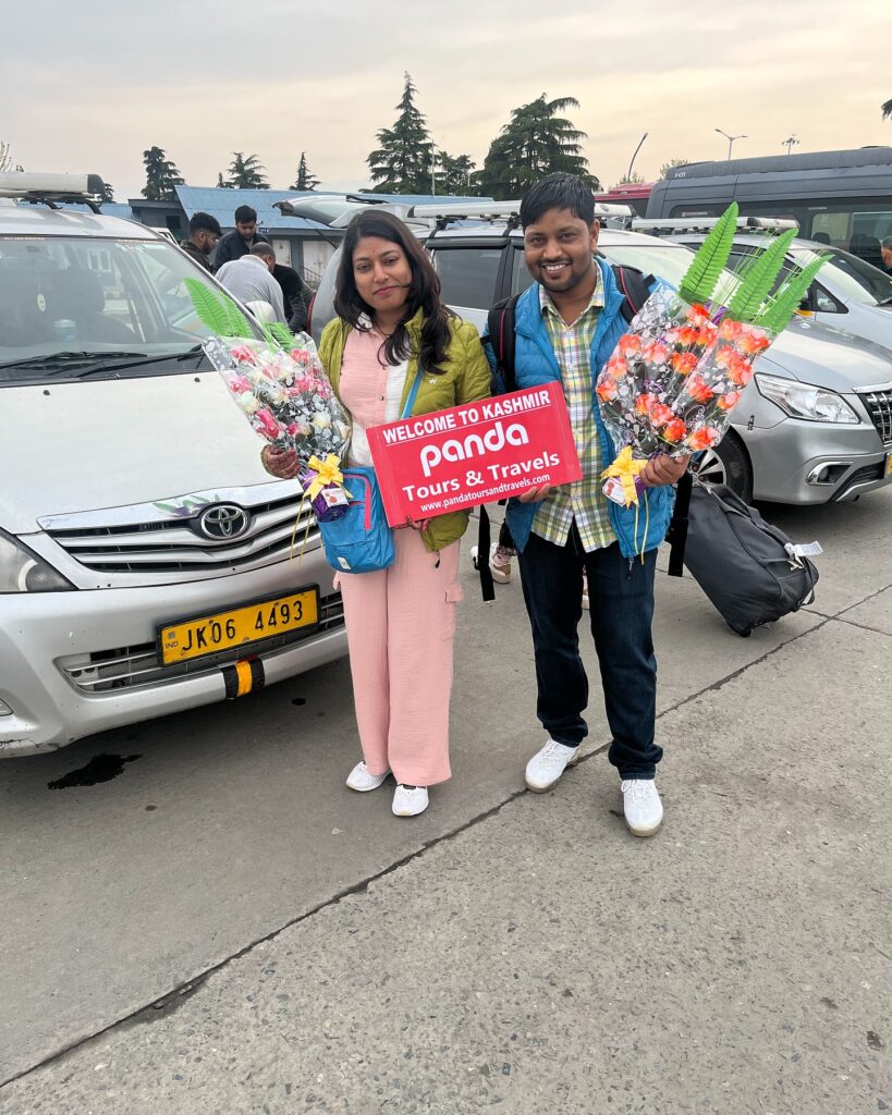 Tourists with Panda Tours and Travels board enjoying their Kashmir travel destinations