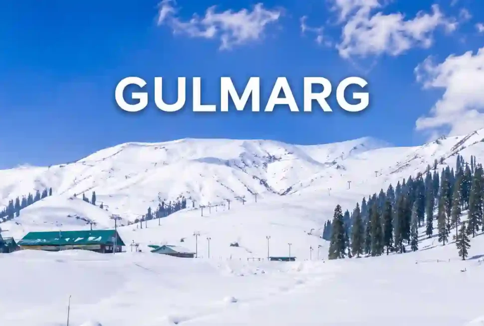 Gulmarg sightseeing places in Kashmir with snow-covered mountains and pine trees
