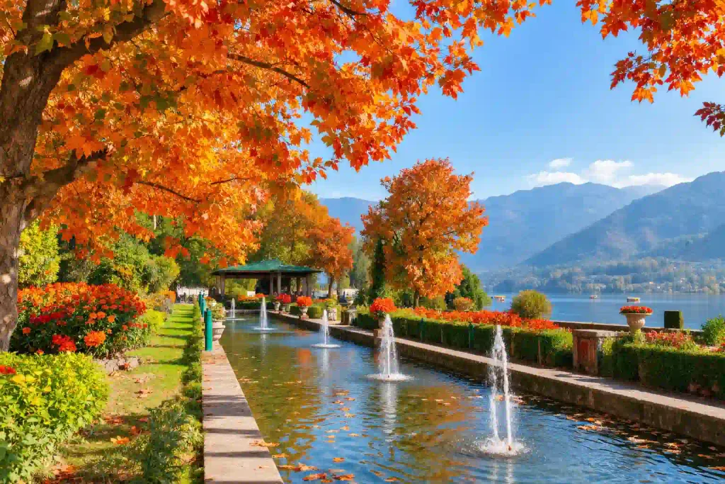 Nishat Garden in Kashmir with vibrant orange chenar trees, fountains, flowers, Dal Lake and mountains