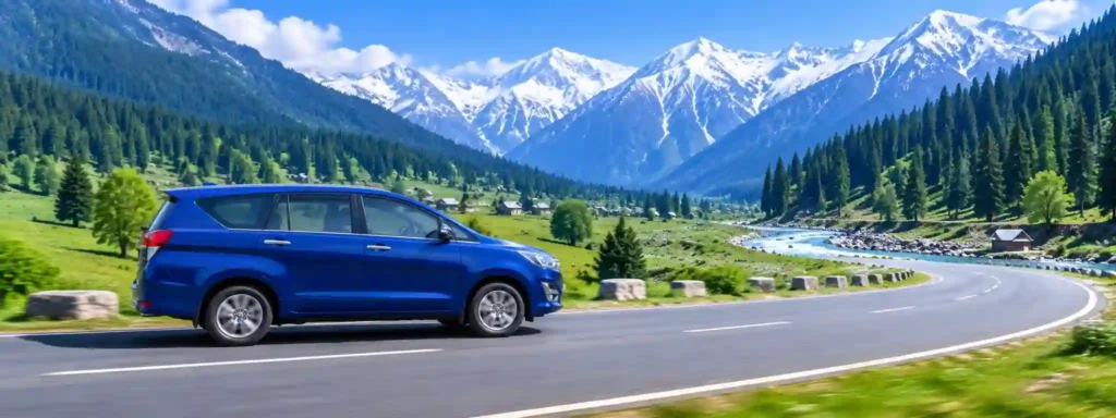 Blue taxi driving on the scenic Srinagar to Pahalgam mountain road in Kashmir