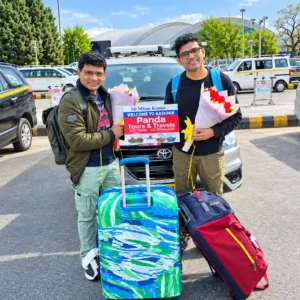 Tourists safely exploring the scenic Betaab Valley in Pahalgam, Kashmir, demonstrating open and secure travel conditions in 2026