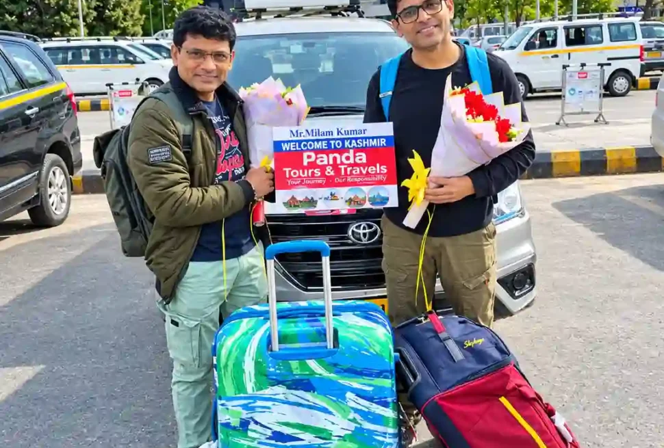 Tourists safely exploring the scenic Betaab Valley in Pahalgam, Kashmir, demonstrating open and secure travel conditions in 2026
