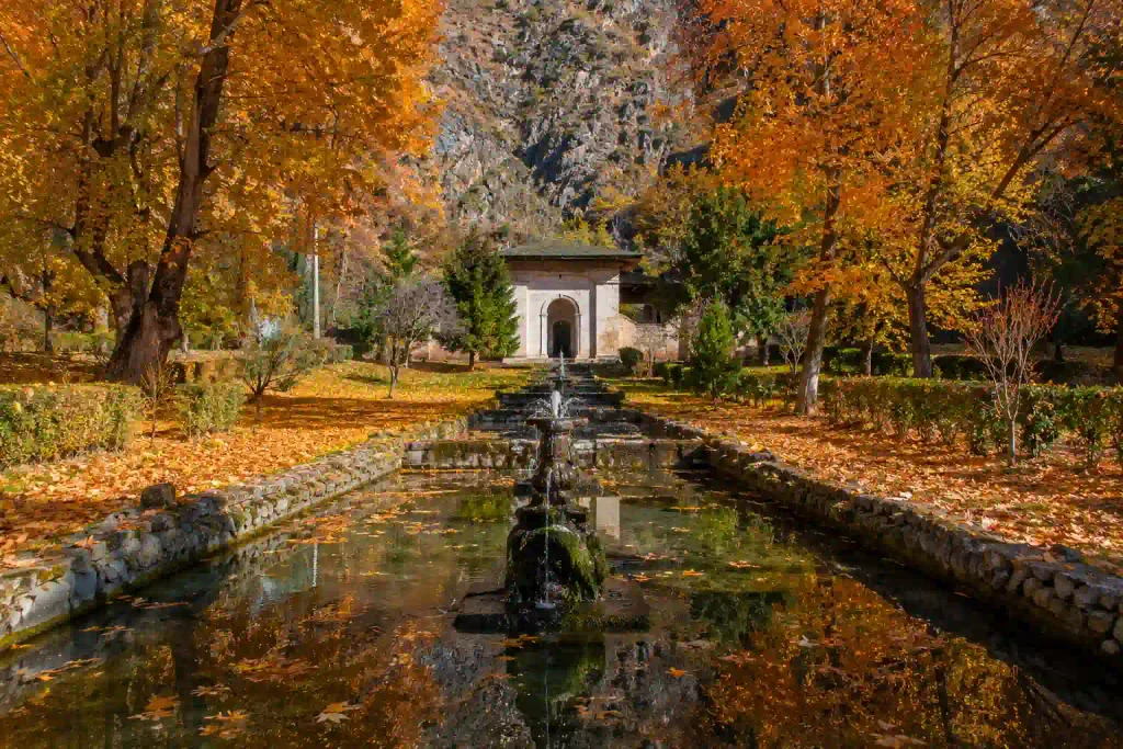 Achabal Garden, Kashmir: History, Location And Travel Guide 2 Achabal Garden in autumn with Mughal-style water channel and golden Chinar trees in Kashmir