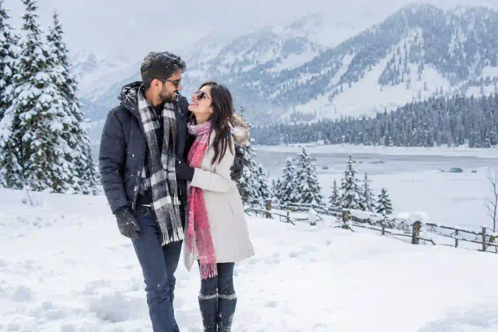 kashmir honeymoon package in which couples enjoying snow in kashmir 