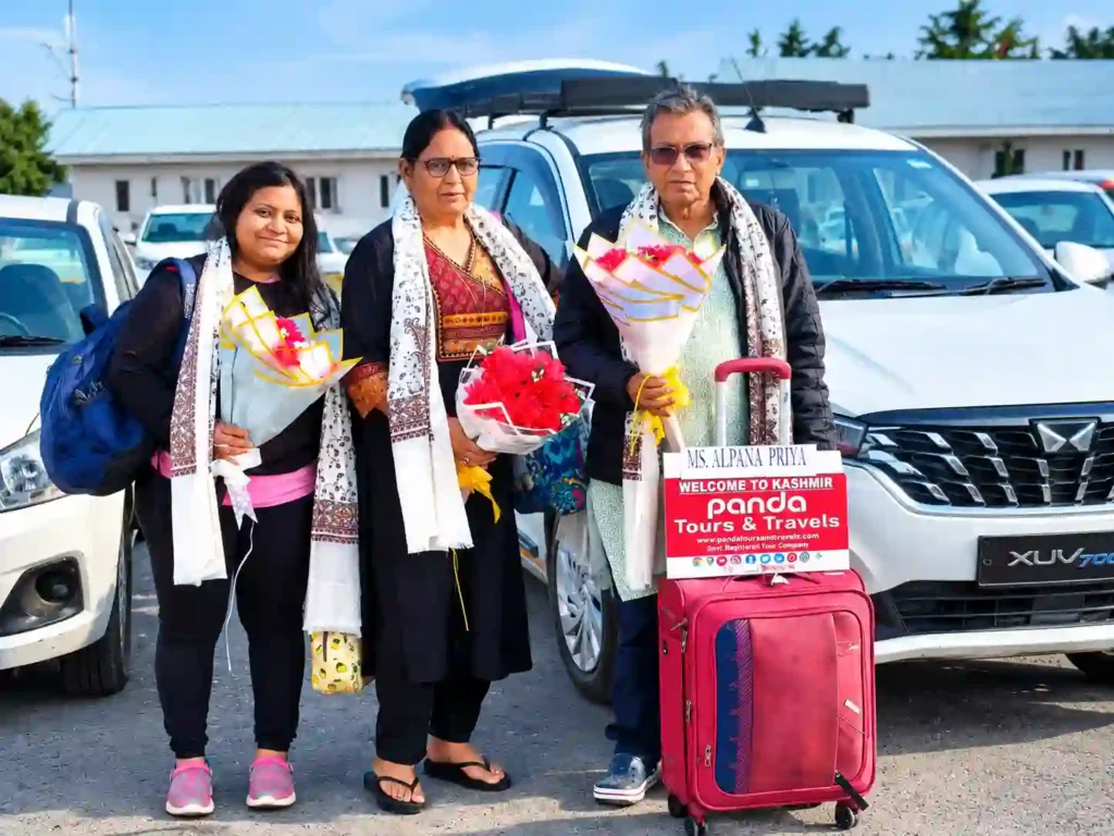 Happy tourists from Bihar enjoying Kashmir trip with Best Travel agency in Srinagar Kashmir